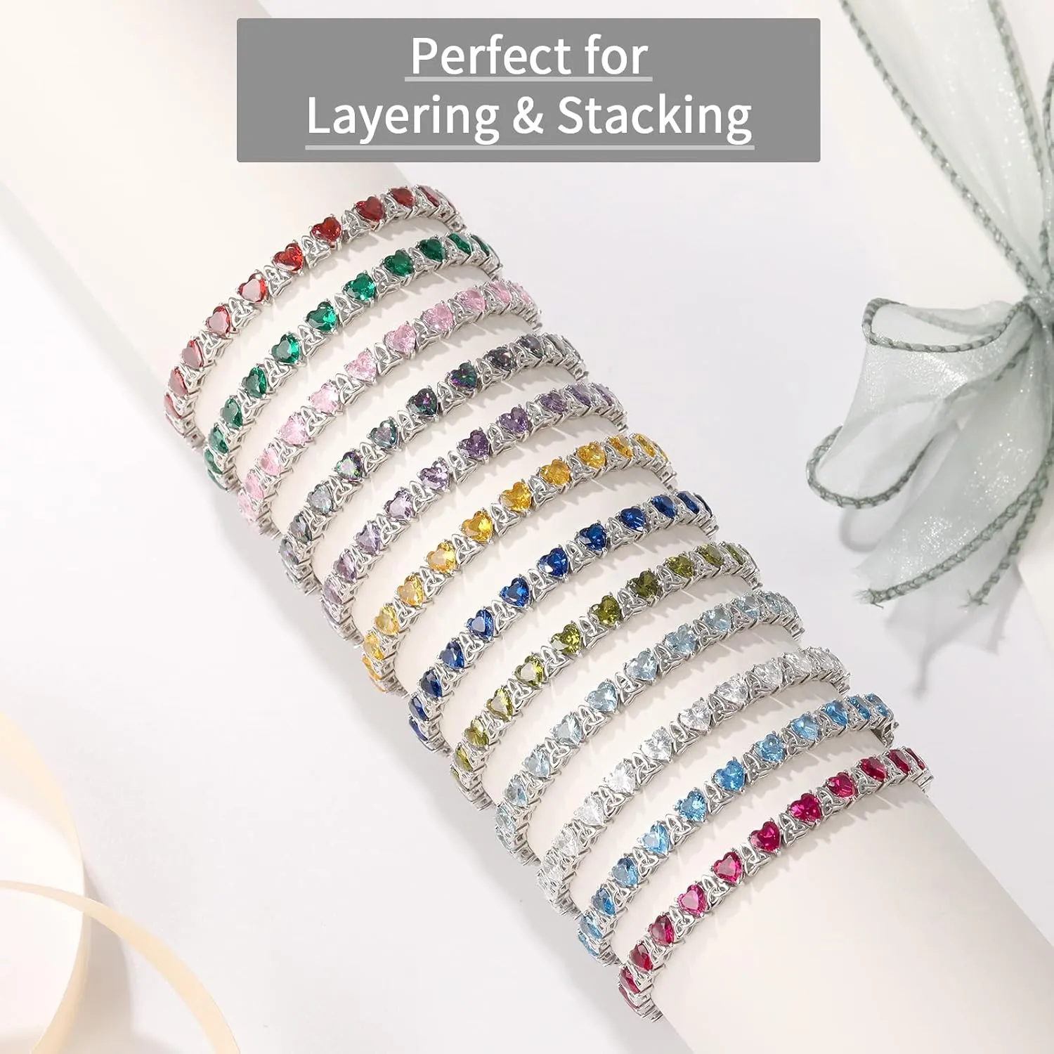 Birthstone bracelet styled with a soft model close-up