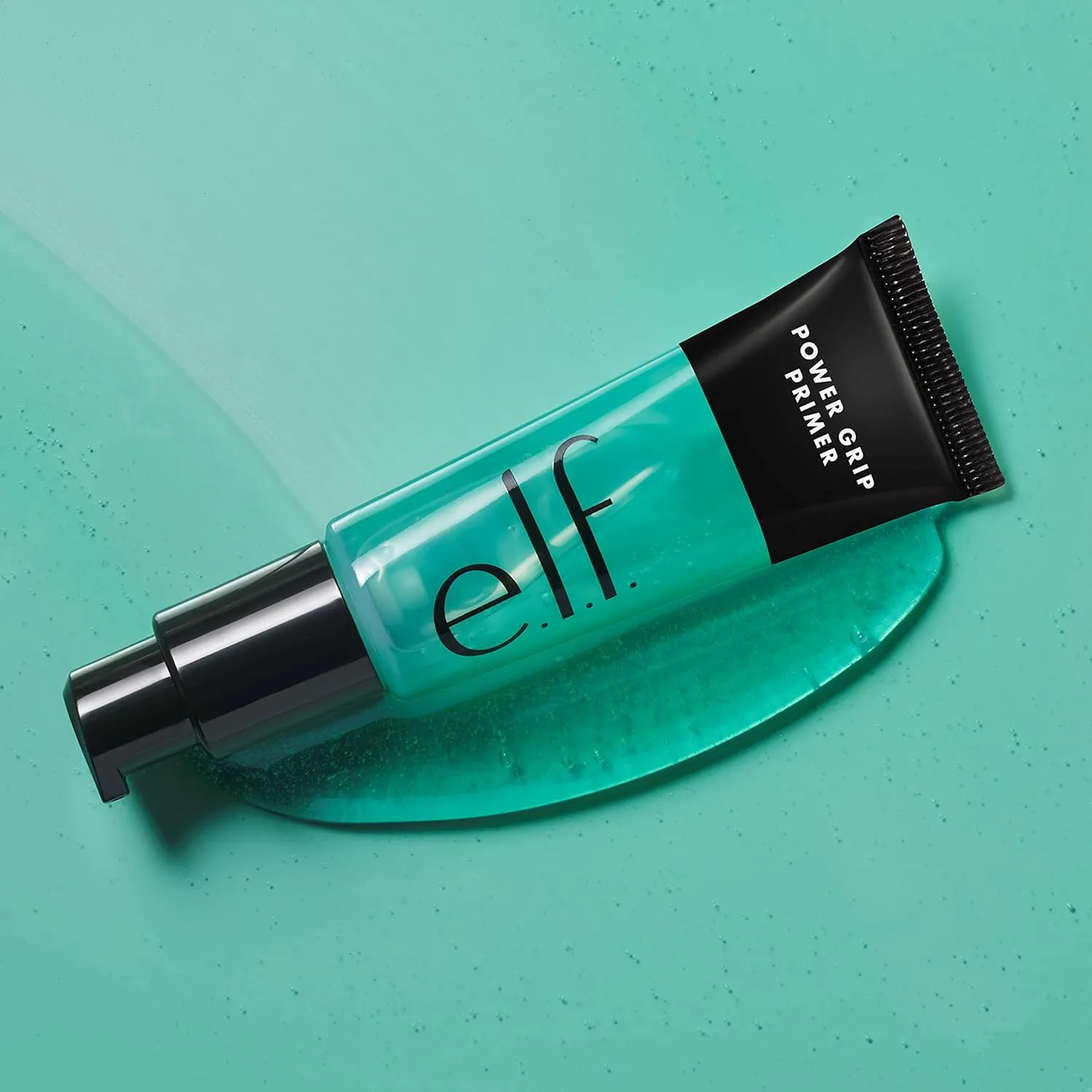 e.l.f. Power Grip Primer product on mint gel texture background