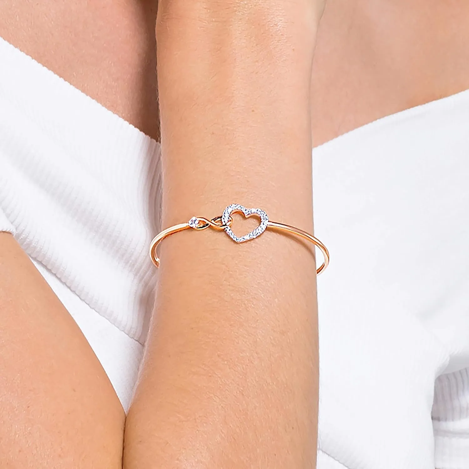 Swarovski infinity heart bracelet worn on wrist