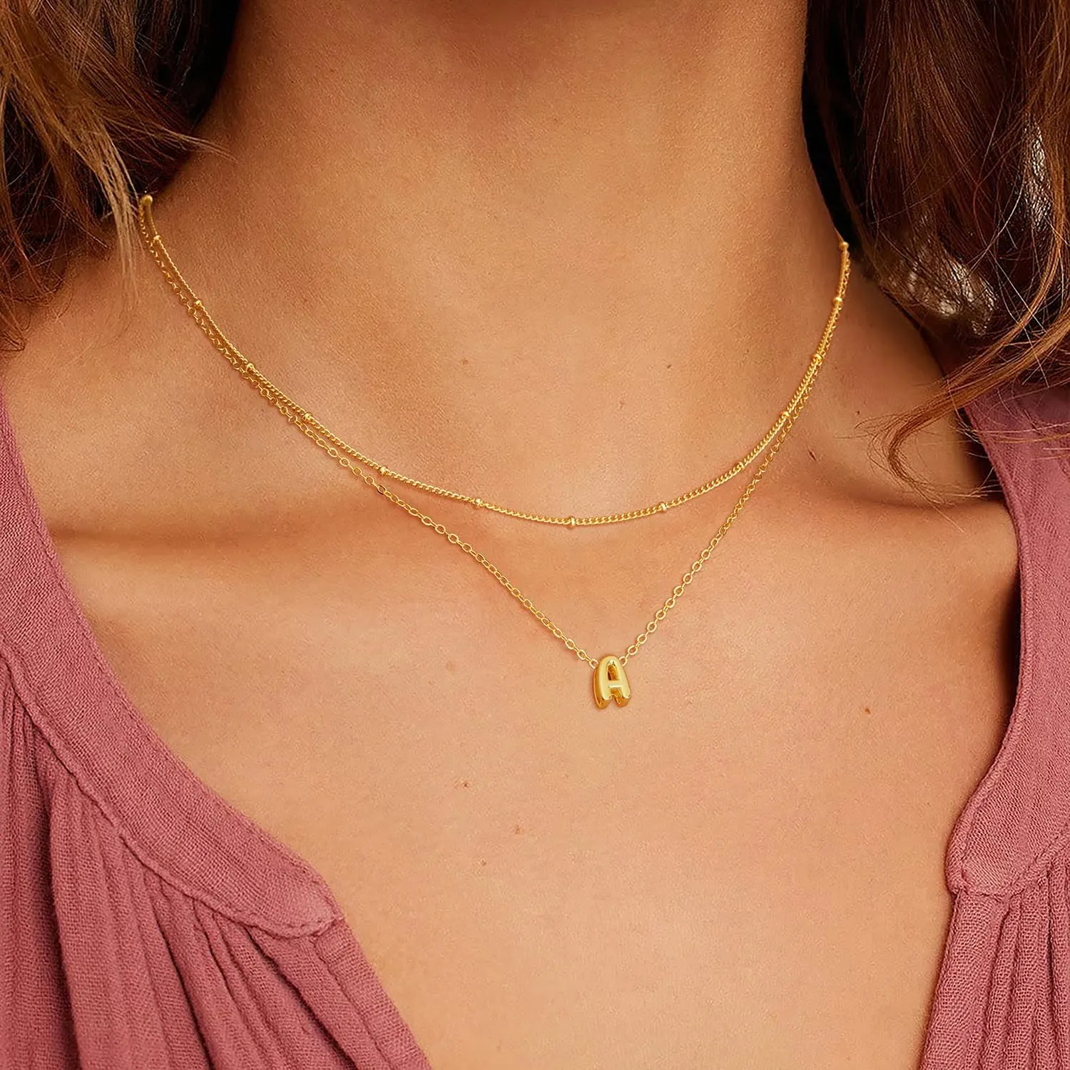 Gold initial necklace product details on a white layout