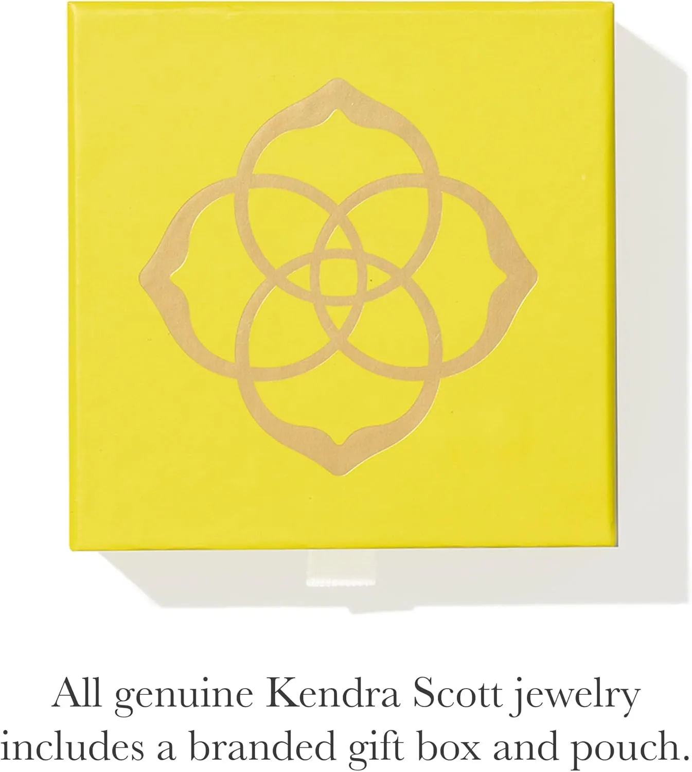 Model wearing Kendra Scott jewelry in soft editorial styling