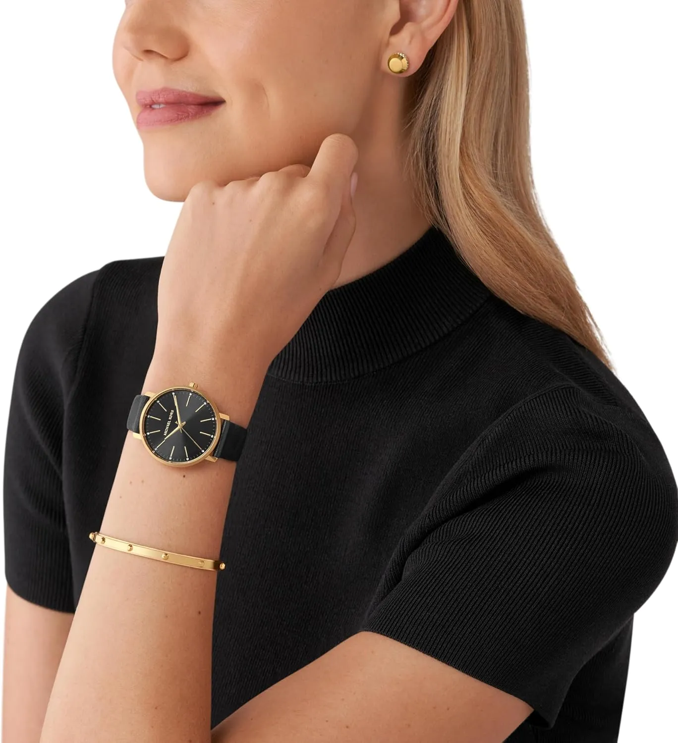 Michael Kors Pyper watch styled on wrist with matching jewelry