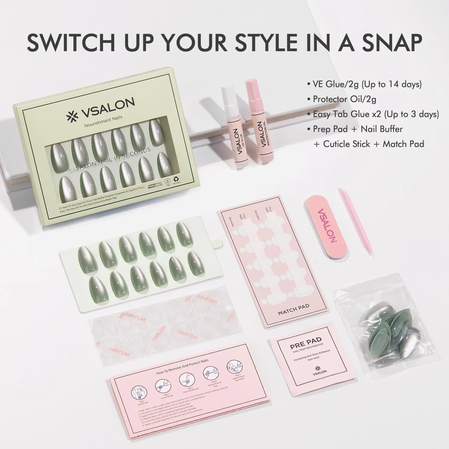 VSALON green chrome almond nails on a clean hand with soft blue background